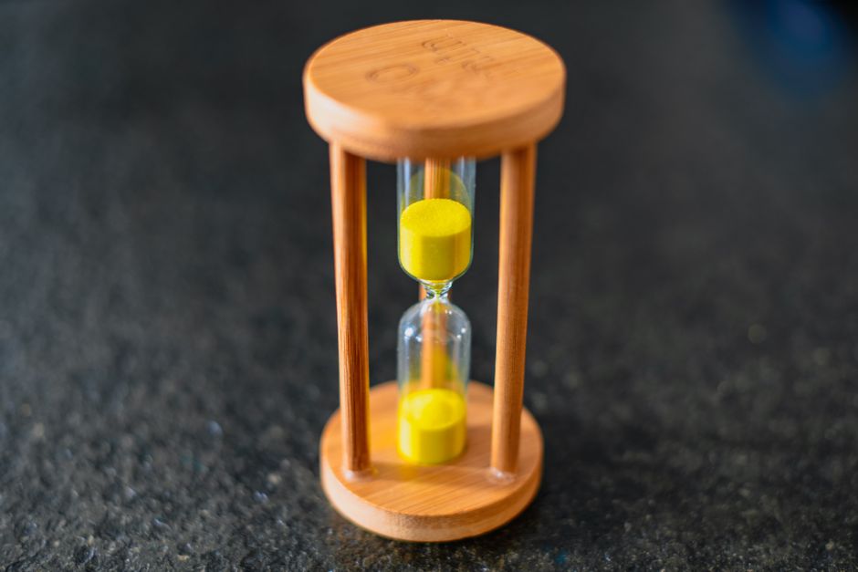 Hourglass standing on a desk