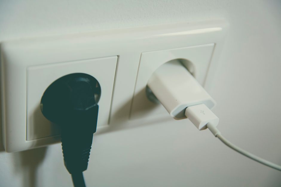 Power adapter plugged into a wall socket