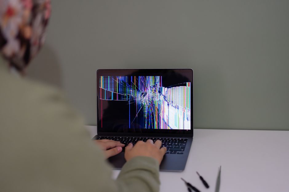 Person troubleshooting a television at home