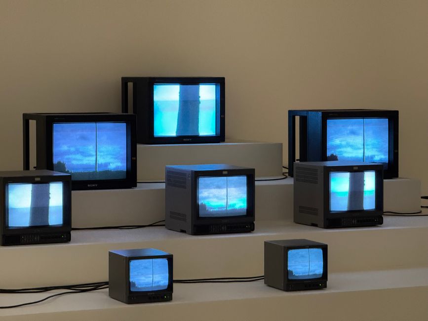 Television screen showing a loading indicator mid-stream