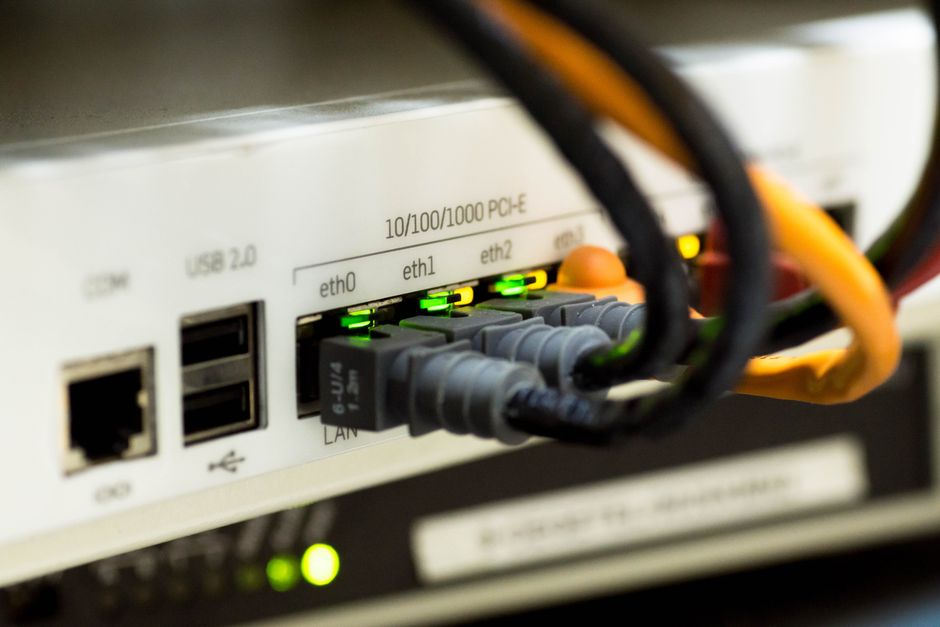 Ethernet cable plugged into a home router