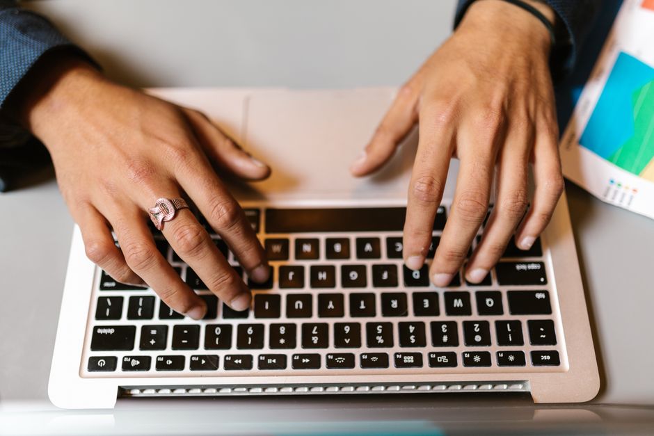 Person typing an email message