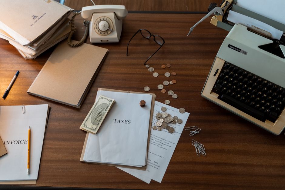 Invoice and money on a desk