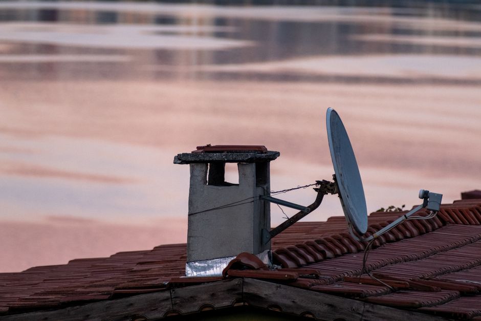 Satellite dish mounted on a rooftop